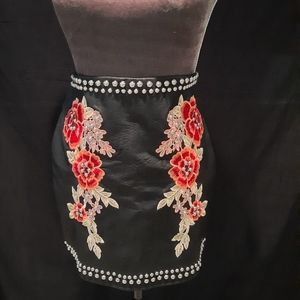 Black leather embroidered skirt